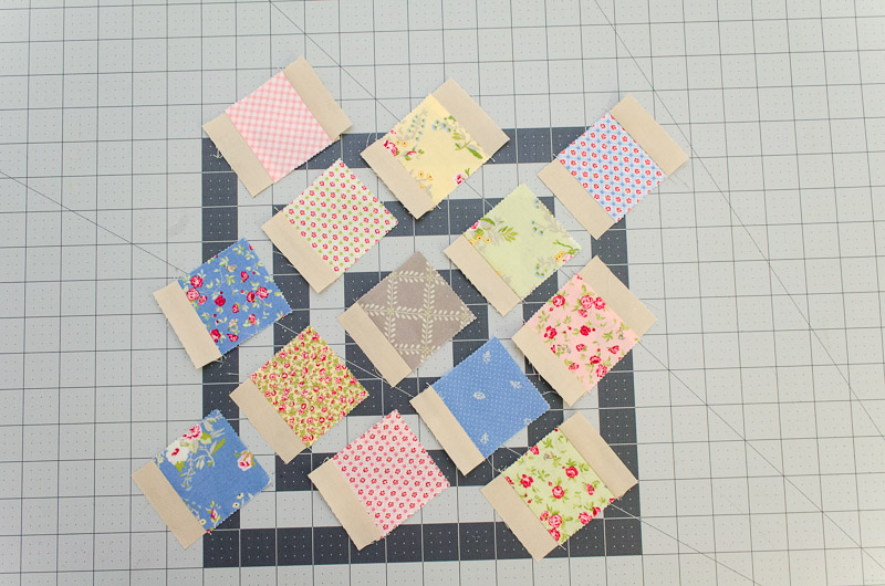 Sew small sashing strips to the mini charms