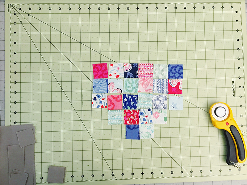 Arrange the patchwork pieces as desired