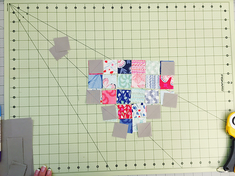 Patchwork heart with marked squares for the easy corner triangles